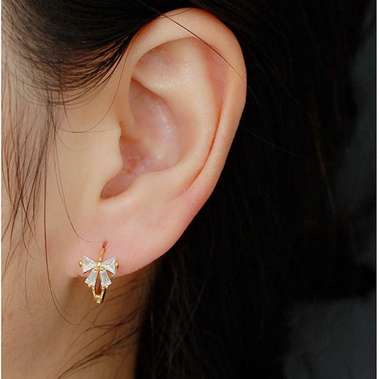 Ragyogó masnis ezüst fülbevaló