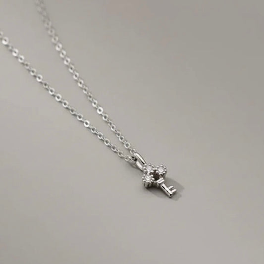 Tiny key silver necklace